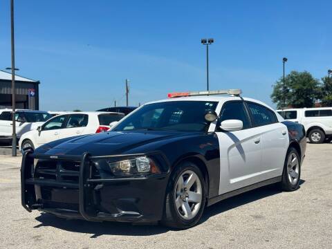2013 Dodge Charger for sale at Chiefs Auto Group in Hempstead TX