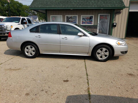 2011 Chevrolet Impala for sale at H & L AUTO SALES LLC in Wyoming MI