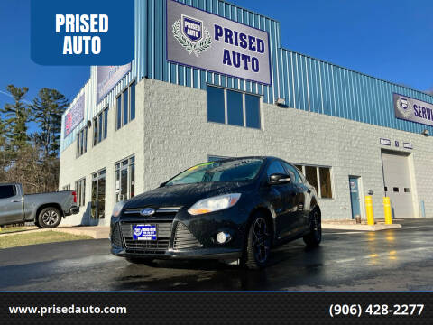 2014 Ford Focus for sale at PRISED AUTO in Gladstone MI