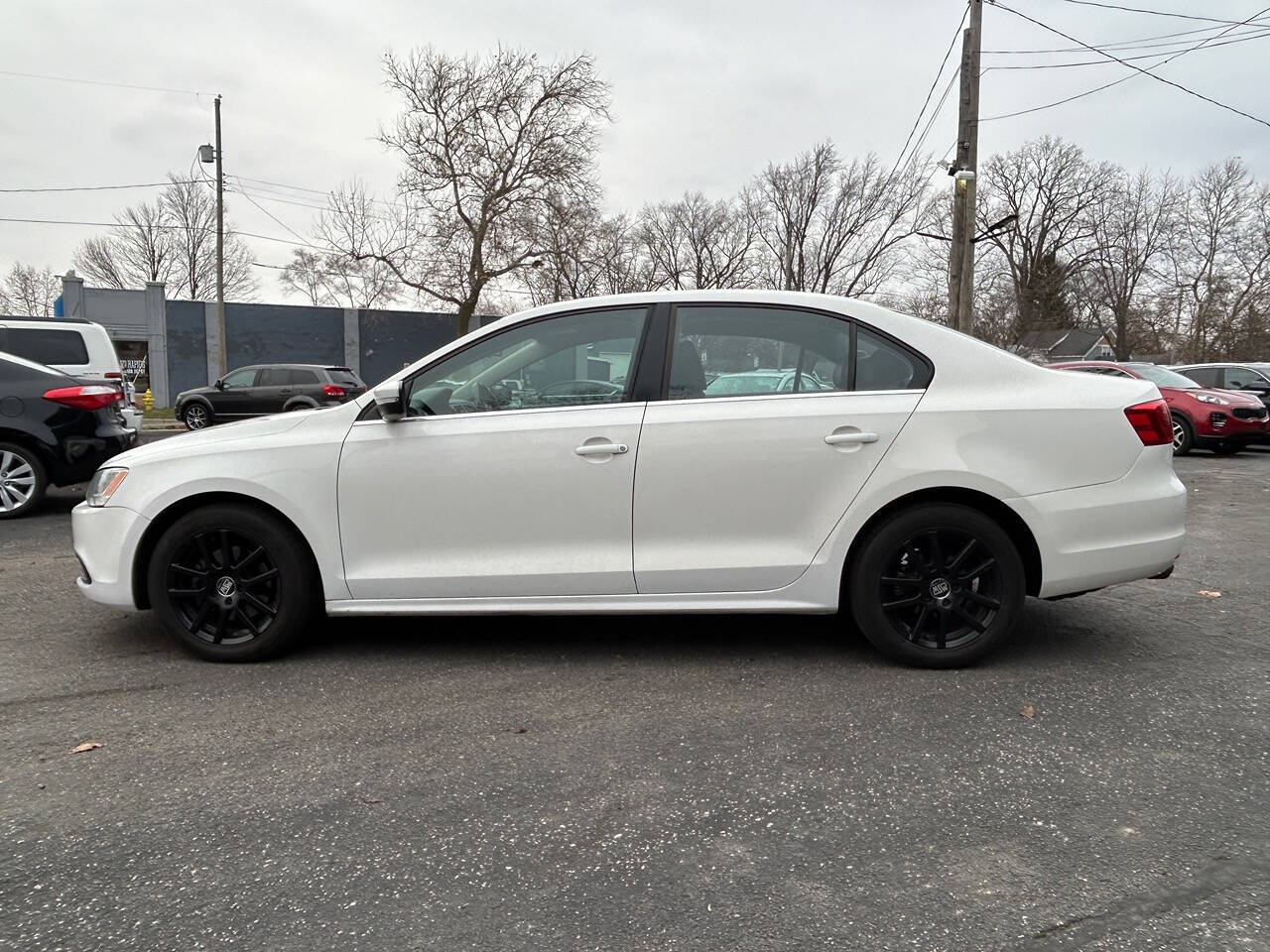 2013 Volkswagen Jetta for sale at Auto Shop in Wyoming, MI