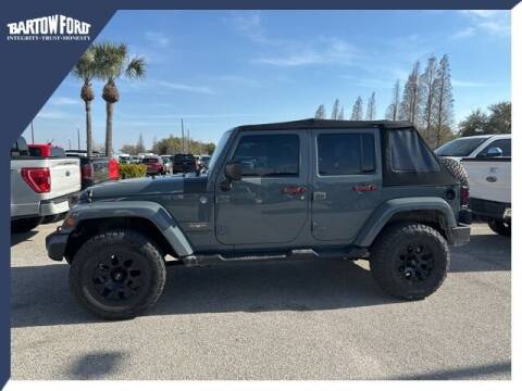 2015 Jeep Wrangler Unlimited for sale at BARTOW FORD CO. in Bartow FL