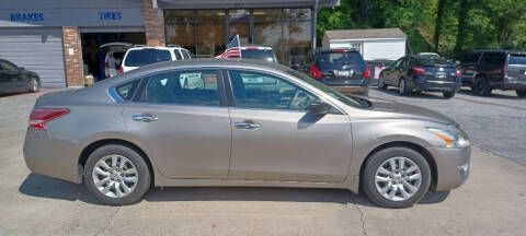 2014 Nissan Altima for sale at Family First Auto in Spartanburg SC