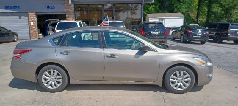 2014 Nissan Altima for sale at Family First Auto in Spartanburg SC