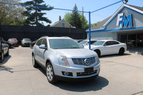 2015 Cadillac SRX for sale at F & M AUTO SALES in Detroit MI