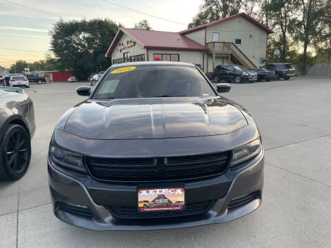 2016 Dodge Charger for sale at Azteca Auto Sales LLC in Des Moines IA