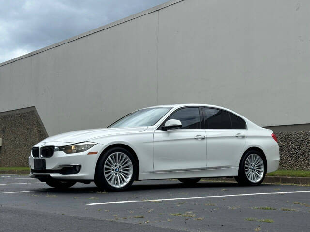 2012 BMW 3 Series for sale at Prompt Luxury Cars LLC in Austell, GA