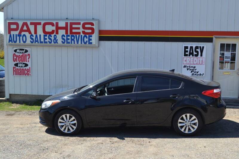 2014 Kia Forte for sale at Patches Enterprises, Ltd. in Reed City MI