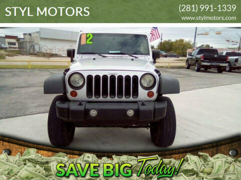 2012 Jeep Wrangler Unlimited for sale at STYL MOTORS in Pasadena TX