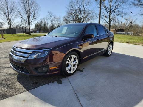2012 Ford Fusion for sale at COOP'S AFFORDABLE AUTOS LLC in Otsego MI