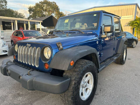 2009 Jeep Wrangler Unlimited for sale at RoMicco Cars and Trucks in Tampa FL