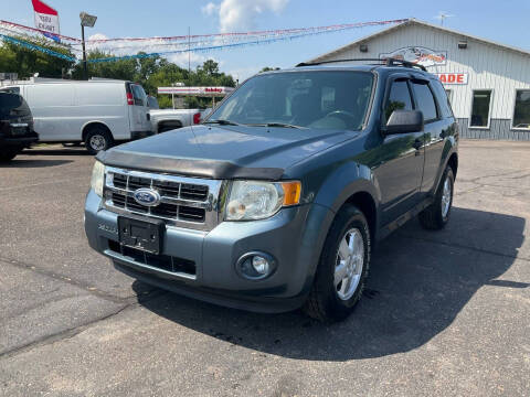 2010 Ford Escape for sale at Steves Auto Sales in Cambridge MN