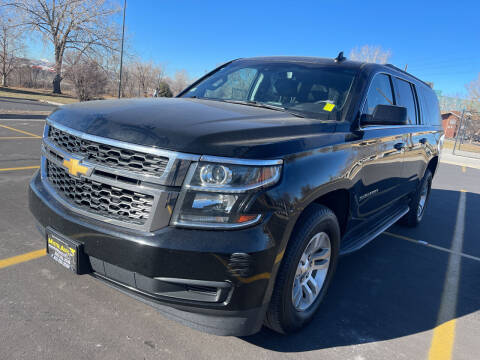 2018 Chevrolet Suburban for sale at Mister Auto in Lakewood CO