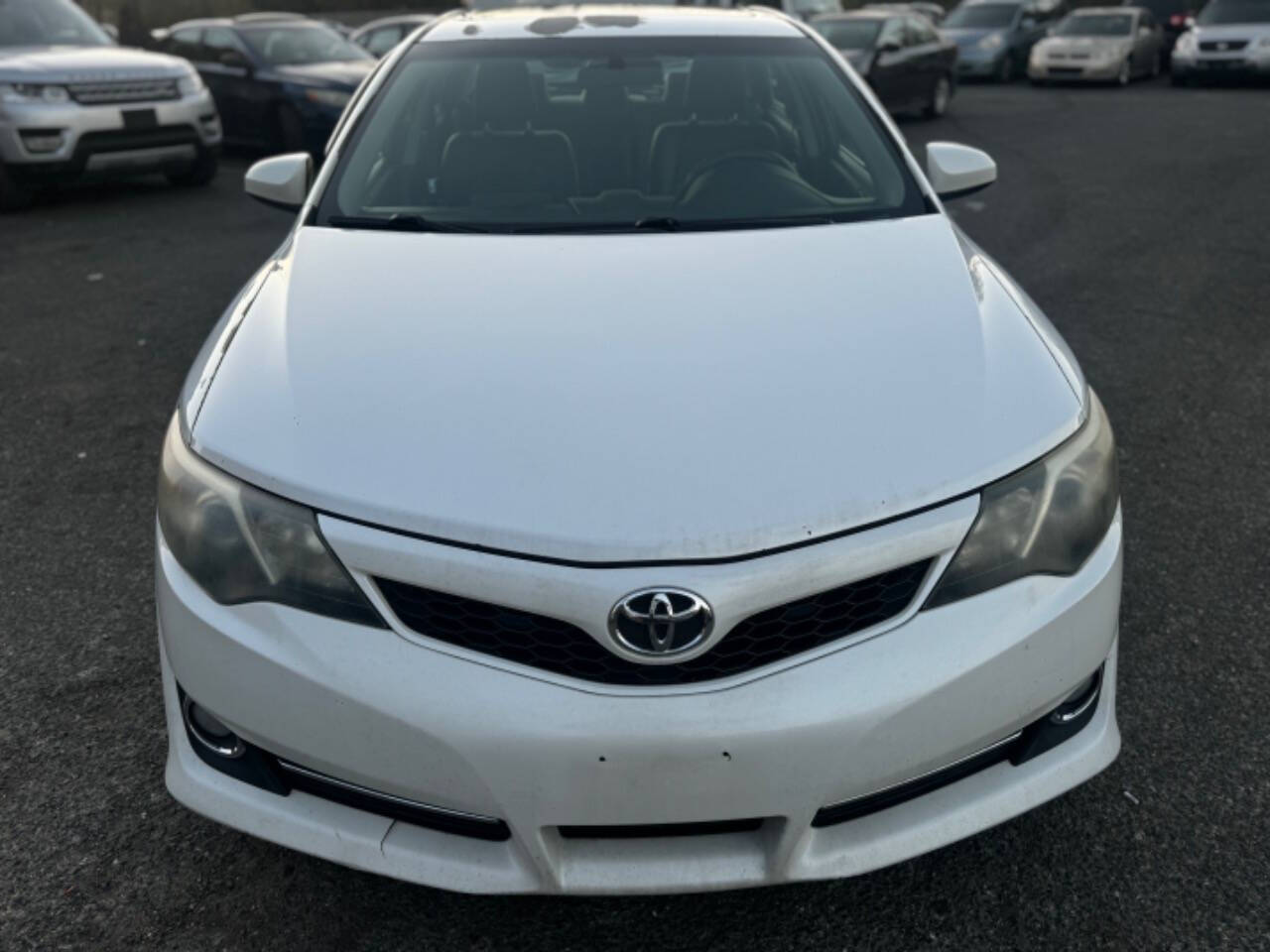 2014 Toyota Camry for sale at Walkem Autos in District Heights, MD