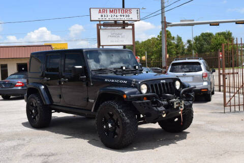 2013 Jeep Wrangler Unlimited for sale at ARI Motors in Houston TX
