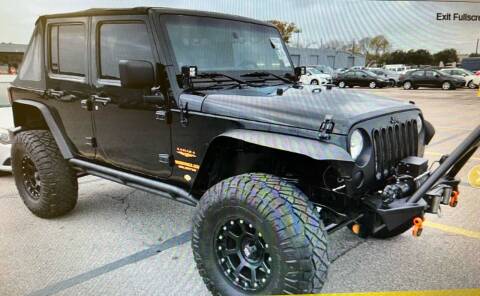 2012 Jeep Wrangler Unlimited for sale at Pioneer Auto in Ponca City OK