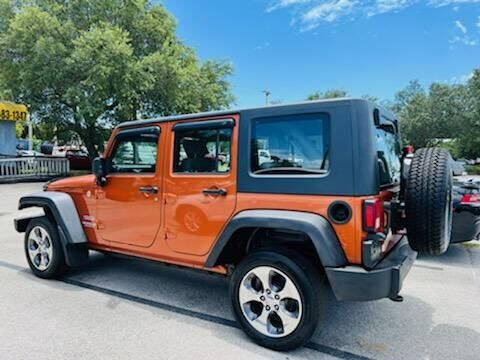 2010 Jeep Wrangler Unlimited for sale at DAN'S DEALS ON WHEELS AUTO SALES, INC. in Davie FL