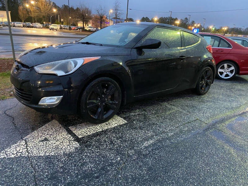 2012 Hyundai Veloster for sale at Mandingo's Automotive & Sales LLC in Snellville GA