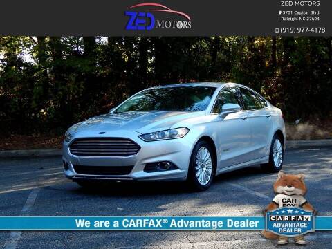 2013 Ford Fusion Hybrid for sale at Zed Motors in Raleigh NC