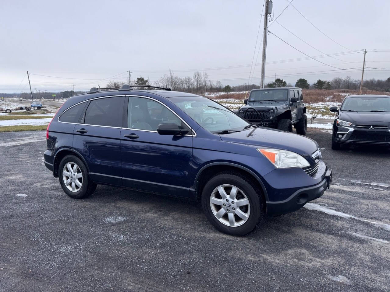 2009 Honda CR-V for sale at Riverside Motors in Glenfield, NY