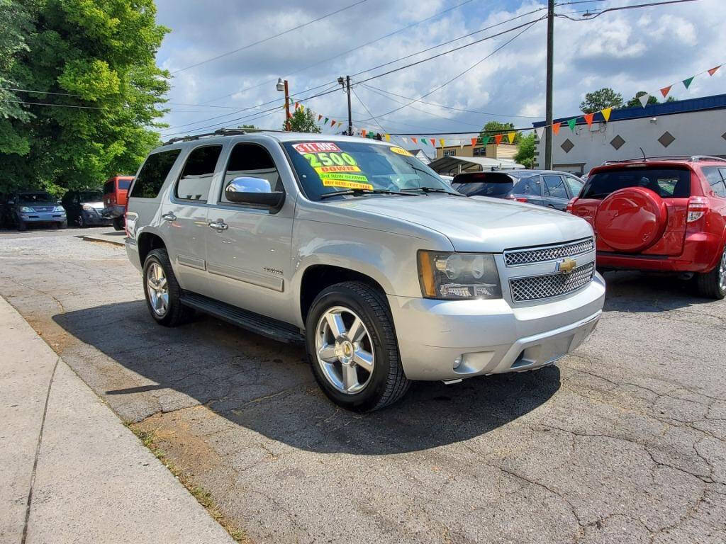 2011 Chevrolet Tahoe for sale at DAGO'S AUTO SALES LLC in Dalton, GA