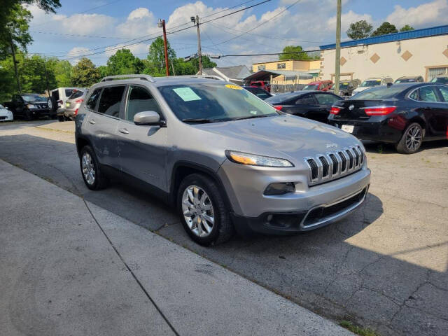 2014 Jeep Cherokee for sale at DAGO'S AUTO SALES LLC in Dalton, GA