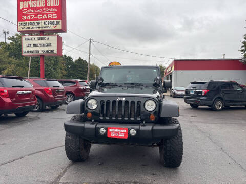 2011 Jeep Wrangler Unlimited for sale at Parkside Auto Sales & Service in Pekin IL