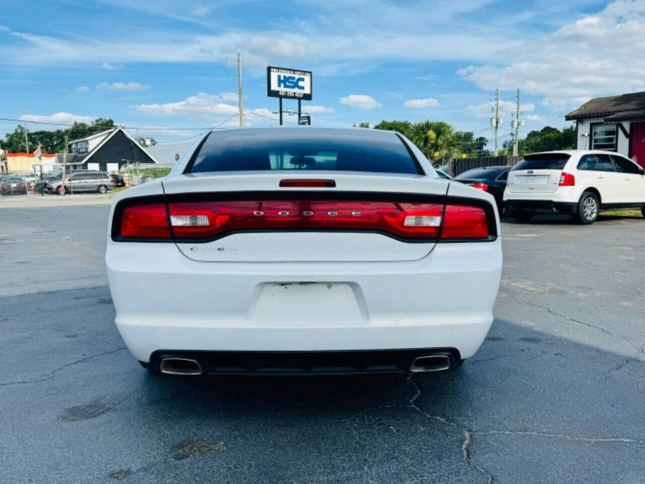 2014 Dodge Charger for sale at NOVA AUTO SALES in Orlando, FL