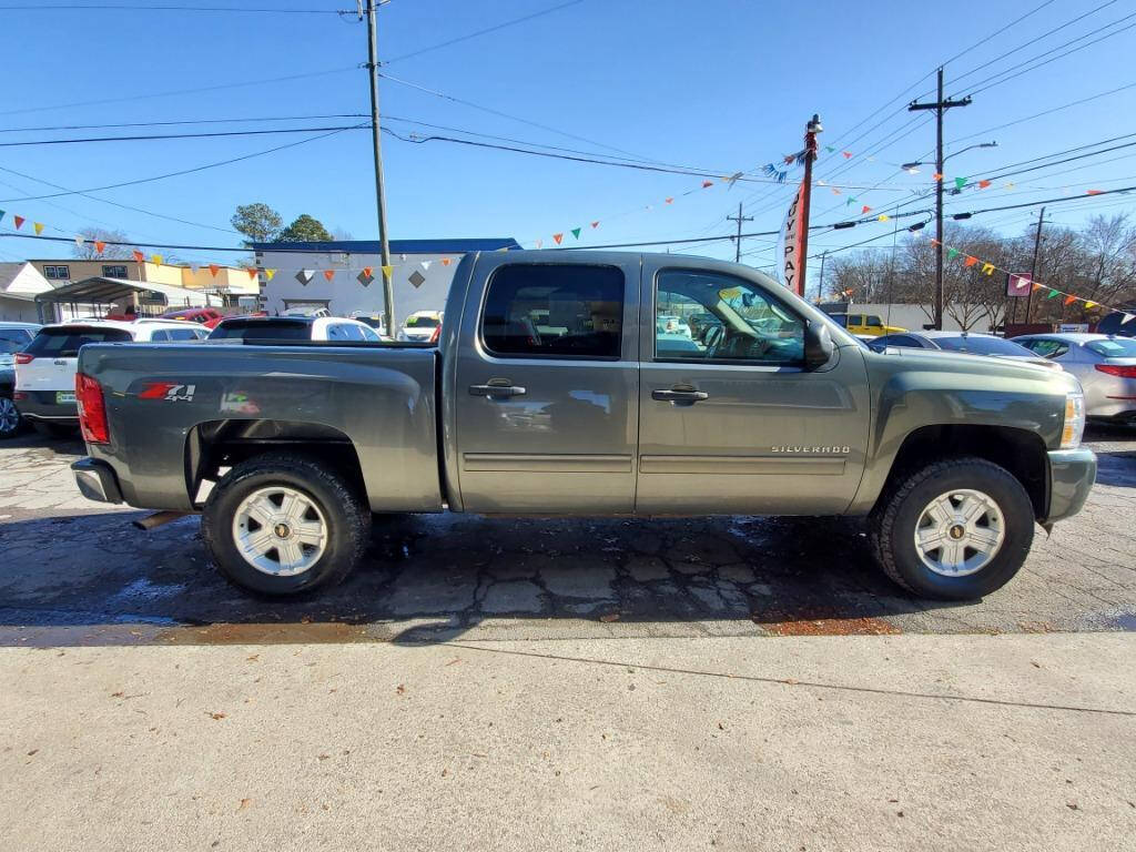 2011 Chevrolet Silverado 1500 for sale at DAGO'S AUTO SALES LLC in Dalton, GA