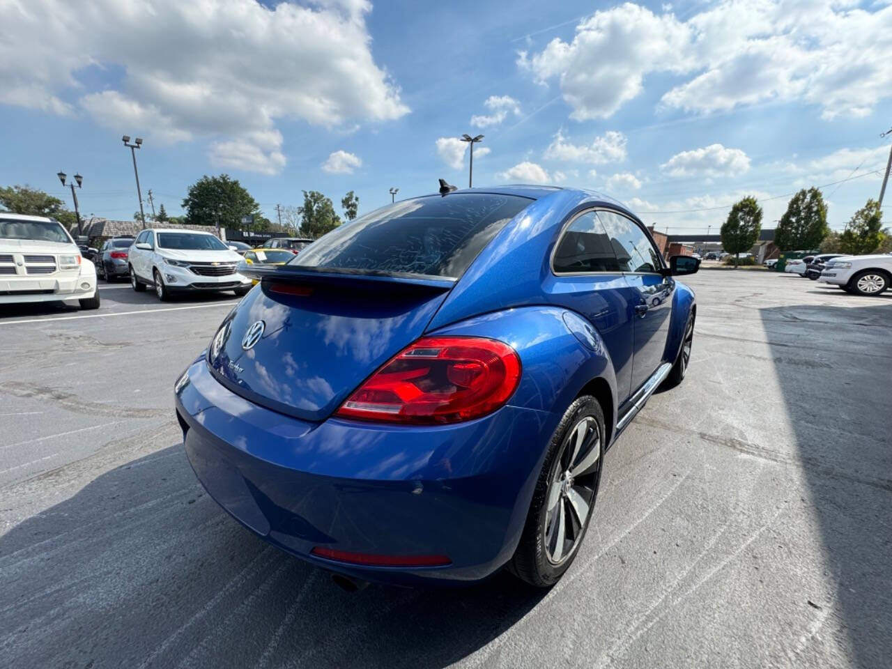 2013 Volkswagen Beetle for sale at Opus Motorcars in Utica, MI