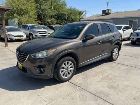 2016 Mazda CX-5 for sale at A AND A AUTO SALES in Gadsden AZ