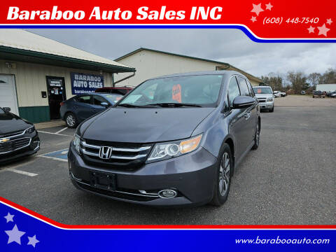 2014 Honda Odyssey for sale at Baraboo Auto Sales INC in Baraboo WI