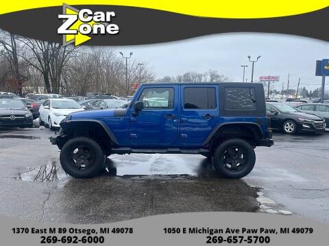 2009 Jeep Wrangler Unlimited for sale at Car Zone in Otsego MI