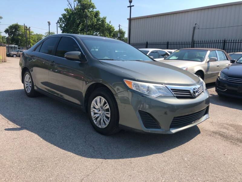 2013 Toyota Camry for sale at CERTIFIED AUTO GROUP in Houston TX
