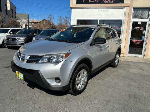2015 Toyota RAV4 for sale at ADAM AUTO AGENCY in Rensselaer NY