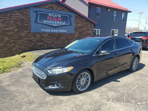 2014 Ford Fusion for sale at Rick's R & R Wholesale, LLC in Lancaster OH
