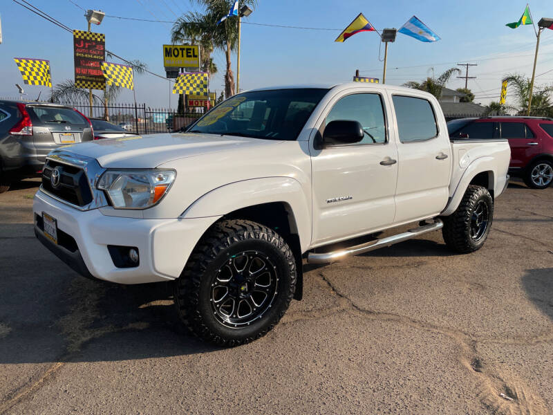 2014 Toyota Tacoma for sale at JR'S AUTO SALES in Pacoima CA