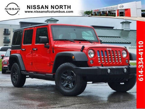 2016 Jeep Wrangler Unlimited for sale at Auto Center of Columbus in Columbus OH