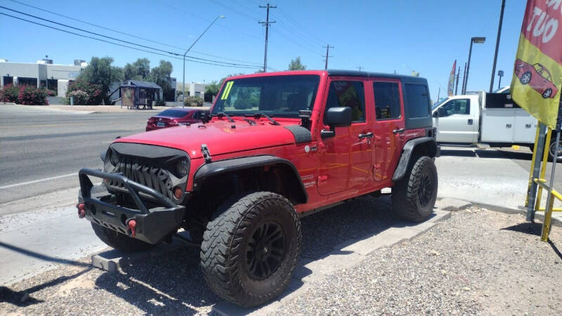 2011 Jeep Wrangler Unlimited for sale at CAMEL MOTORS in Tucson AZ