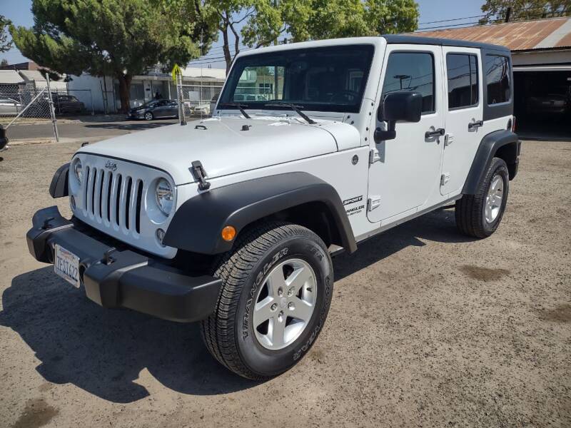 2015 Jeep Unlimited  for sale at Larry's Auto Sales Inc. in Fresno CA