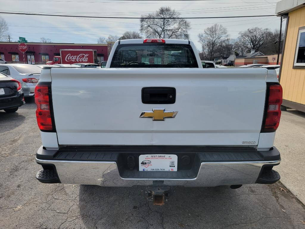 2015 Chevrolet Silverado 2500HD for sale at DAGO'S AUTO SALES LLC in Dalton, GA