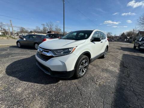 2019 Honda CR-V for sale at The Car Cove, LLC in Muncie IN