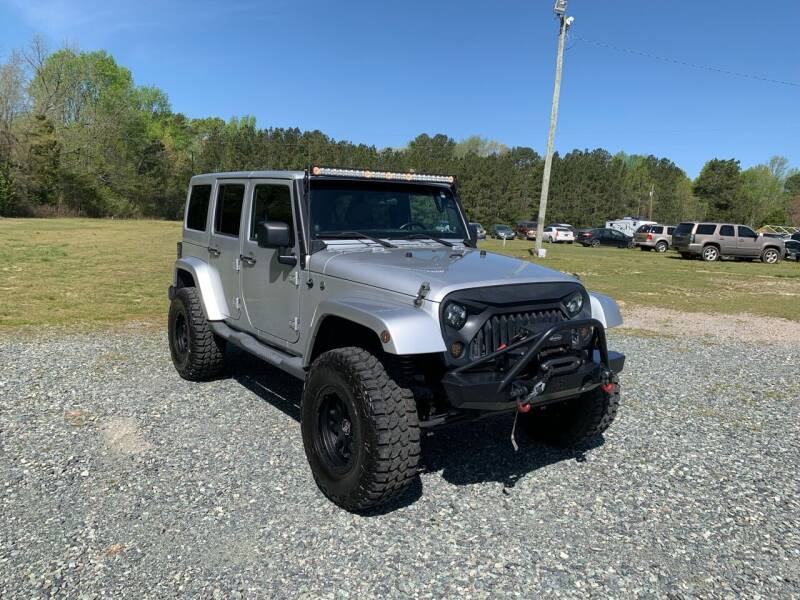 2011 Jeep Wrangler Unlimited for sale at Sanford Autopark in Sanford NC