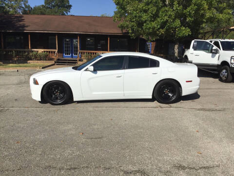 2014 Dodge Charger for sale at Victory Motor Company in Conroe TX