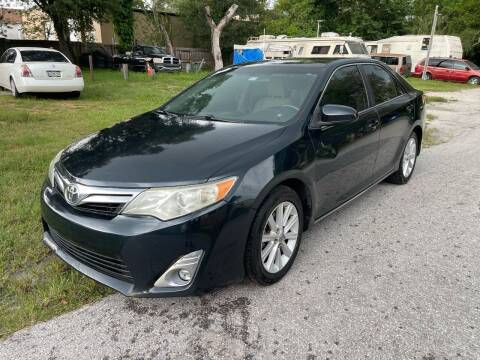2014 Toyota Camry for sale at Amo's Automotive Services in Tampa FL
