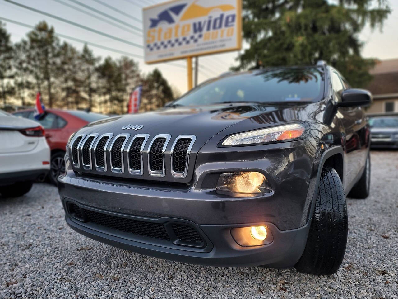 2015 Jeep Cherokee for sale at Statewide Auto LLC in Akron, OH