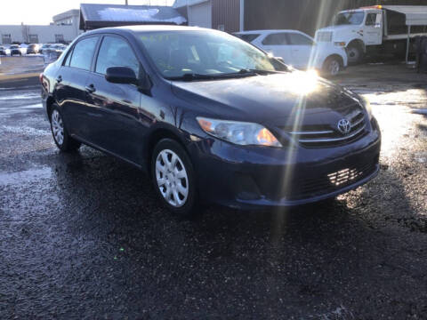 2013 Toyota Corolla for sale at Sparkle Auto Sales in Maplewood MN