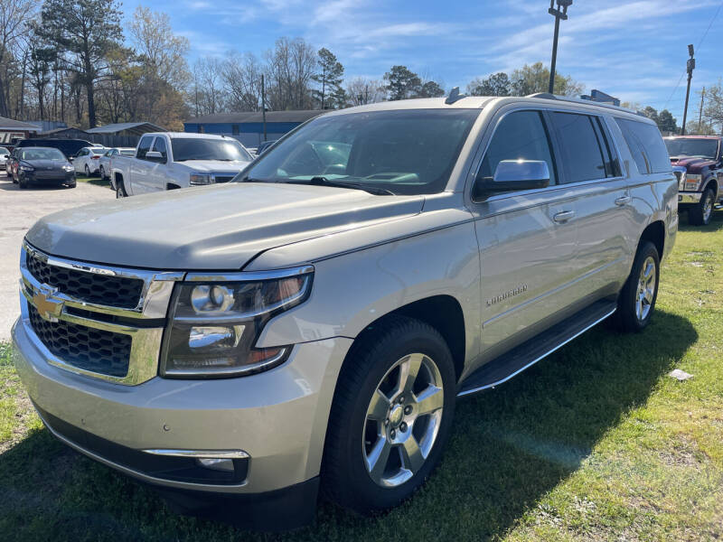 2017 Chevrolet Suburban for sale at LAURINBURG AUTO SALES in Laurinburg NC