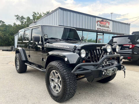 2012 Jeep Wrangler Unlimited for sale at Carworks in Osage Beach MO