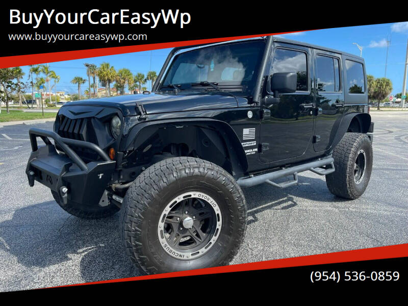 2011 Jeep Wrangler Unlimited for sale at BuyYourCarEasyWp in West Park FL