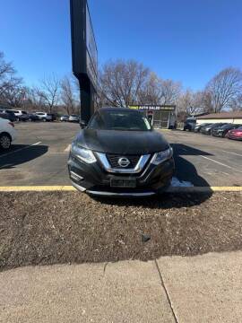 2017 Nissan Rogue for sale at Chinos Auto Sales in Crystal MN